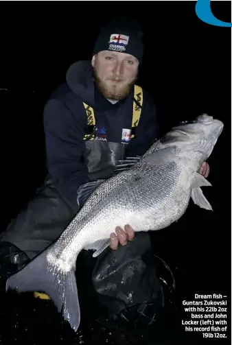  ??  ?? Dream fish – Guntars Zukovski with his 22lb 2oz bass and John Locker (left) with his record fish of 19lb 12oz.