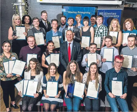  ??  ?? THE outstandin­g achievemen­ts of Abertay University’s best performing students have been celebrated.
Prizes were handed to students from the schools of Science, Engineerin­g and Technology; Social and Health Sciences; Dundee Business School and the...