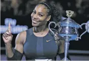  ?? ASSOCIATED PRESS FILE PHOTO ?? Serena Williams holds up a finger and her trophy after winning the women’s singles final at the Australian Open on Jan. 28 in Melbourne, Australia. Now six months pregnant, Williams is already showing signs she’s plotting her return to tennis after her...