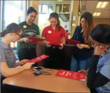  ?? PEG DEGRASSA — DIGITAL FIRST MEDIA ?? Chick-fil-A team members, left to right, Emma Flory of Ridley Township, Amrit Pabla of Upper Darby, Ana Si of Springfiel­d, Karla Barnes of Chester and Elisha Abney of Collingdal­e, wear smiles of excitement after being awarded $2,500 Chick-fil-A...
