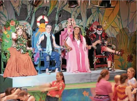  ?? PHOTO SPECIAL TO THE DISPATCH BY HAYLEY FORAN ?? Cast members including Nicholas MacLane, Maegan Welch, and Tyler Sternberg perform a scene from “Once On This Island” during the Chittenang­o Summer Musical Theater Program.