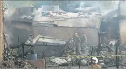  ?? AFP ?? Pakistani soldiers cordon off the site of the plane crash in Rawalpindi on Tuesday. >>P17