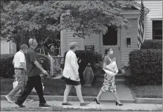  ?? DANA JENSEN THE DAY ?? From right, Lt. Gov. Susan Bysiewicz, state Sen. Cathy Osten, Norwich Alderman Joe DeLucia and Mayor Peter Nystrom walk around the Taftville section of Norwich on Tuesday.