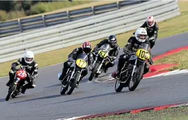  ??  ?? Sunny Saturday Lansdowne action as Adam Wilson (108, Manx 500) leads Stuart Tonge (17, Matchless G50), Mike Farrall (25, Rudge 500), and Harry Cole (63, Manx 500).