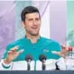  ?? FLORIAN EISELE/GETTY ?? Serbia’s Novak Djokovic attends a press conference on Saturday at The All England Tennis Club in Wimbledon, southwest London, ahead of the start of the Wimbledon Championsh­ips tennis tournament. Djokovic is eyeing Grand Slam history.