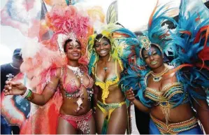  ??  ?? Miami-Broward Carnival brings out the feathers and sequins for a day-long party.