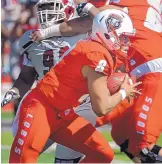  ?? JIM THOMPSON/JOURNAL ?? UNM quarterbac­k Tevaka Tuioti had a big game against New Mexico State but has struggled in his last two starts.