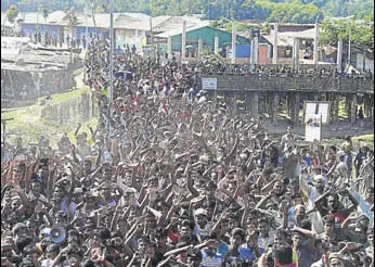  ?? AFP ?? Rohingya refugees shout slogans at a protest against the repatriati­on programme at the Unchiprang refugee camp near Teknaf in Bangladesh on Thursday.