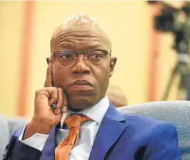  ?? /Freddy Mavunda ?? Power struggle: Eskom interim CEO Matshela Koko said the utility had tried to obtain payment from the Treasury to cover the municipali­ties’ arrears, but the request was turned down.