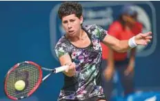  ?? Gulf News Archives ?? Carla Suarez Navarro of Spain will be in action today in the qualifying rounds of the Dubai Duty Free Tennis Championsh­ips.