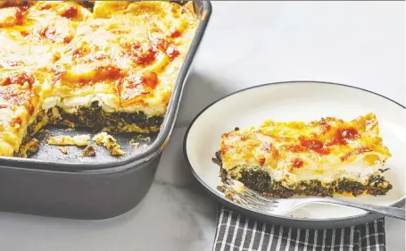  ?? TOM MCCORKLE/THE WASHINGTON POST ?? This kale and mushroom-filled lasagna is a nice change from the usual beef-and-tomato-sauce variety.