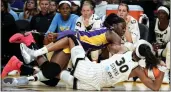  ?? PHOTO BY LIBBY CLINE-BIRMINGHAM ?? Sparks forward Chiney Ogwumike reaches for the ball held by Chicago forward Azura Stevens on Thursday.