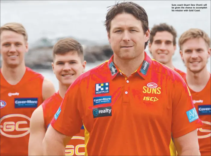  ??  ?? Suns coach Stuart Dew (front) will be given the chance to accomplish his mission with Gold Coast.