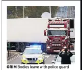  ??  ?? GRIM Bodies leave with police guard