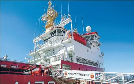  ?? PHOTO: DAVID WALKER/FAIRFAX NZ ?? HMS Protector is in dock at Lyttelton port to refuel and get supplies before heading back to Antarctic waters.