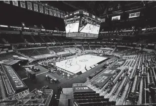  ?? Darron Cummings / Associated Press ?? The NCAA is attempting a “bubble” setup that’s not as stringent as what the NBA pulled off last summer. Multiple Indianapol­is sites will be used, like Bankers Life Fieldhouse, above.