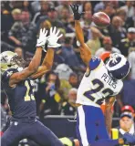  ?? AP FILE PHOTO ?? The Rams’ Marcus Peters, right, is ready to eat. The volatile cornerback promised to have ‘a nice little bowl of gumbo’ with New Orleans coach Sean Payton after Peters felt disrespect­ed in the wake of the Saints’ win over Los Angeles earlier this season.