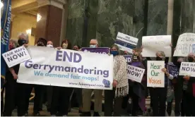  ?? Photograph: Scott Bauer/AP ?? Opponents of Republican redistrict­ing plans protest at the Wisconsin state capitol in Madison on 28 October 2021.