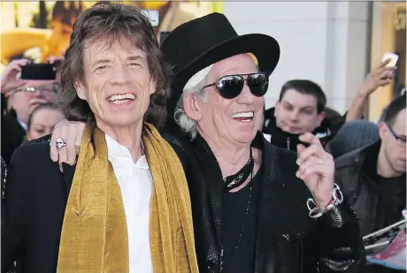  ?? JOEL RYAN/THE ASSOCIATED PRESS ?? Rolling Stones bandmates Mick Jagger, left, and Keith Richards have known each since they were young children and despite some strained moments, their friendship and their partnershi­p remains strong and shows no sign of abating.