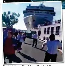  ??  ?? Panic stations: Tourists on the dock flee as the huge cruise ship hits the riverboat Aftermath: Rescue workers examine the damage to the River Countess. The MSC Opera cruise ship looms over it