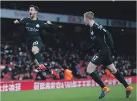  ?? Reuters ?? Bernardo Silva, left, and Kevin De Bruyne have been on a roll with Manchester City looking strong at the top of the Premier League table