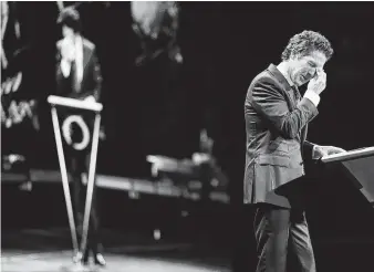  ?? Elizabeth Conley / Houston Chronicle ?? Joel Osteen keeps a tissue in his pocket for those moments onstage when the spotlights catch his tears, as was the case when he was talking about his brother during a Night of Hope event.