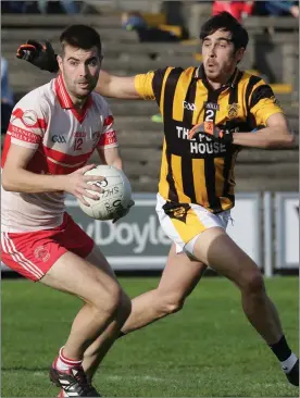  ??  ?? Kilanerin’s Dean O’Toole steals a march on Shelmalier­s defender Andre O’Brien.