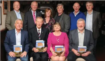  ??  ?? Launching Sand in our Boots at the Cliff House Hotel were, back from left: Paudie Mulvihill, Jimmy Buckley, Catheine Ellis (secretary), Tom Allen, Liam Browne and John Hennessy. Front from left: Ogie Moran, Mícheál Ó Muircheart­aigh, History Committee...