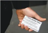  ??  ?? Miracle Messages founder Kevin Adler distribute­s cards to people living on the city’s streets to reconnect them with loved ones. The nonprofit has helped arrange 194 reunions.