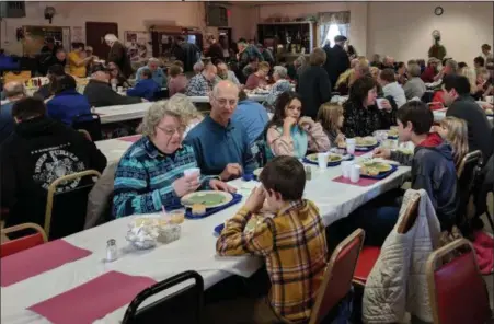  ?? SUBMitteD Photo ?? More than 900 dinners were served at the ruscombman­or Fire company new year’s Day Pork and Kraut Dinner.