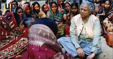  ?? — acm file photo ?? drameen bank’s Muhammad yunus in a meeting with women entreprene­urs in dhaka.