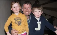  ?? Isabelle, Denis and Darragh Carey at the Charolaise Bull Show and Sale at Gortatlea Mart. ??