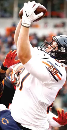  ?? | ANDY LYONS/ GETTY IMAGES ?? Rookie tight end Adam Shaheen, who had four receptions for 44 yards, catches a one yard touch down pass in the fourth quarter Sunday at Paul Brown Stadium.