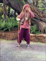 ?? JANET PODOLAK — THE NEWS-HERALD ?? Humans who remained behind after the “Avatar” conflict between people and the indigenous Na’vi on Pandora have adapted to life in the story of the new area at Disney World’s Animal Kingdom.
