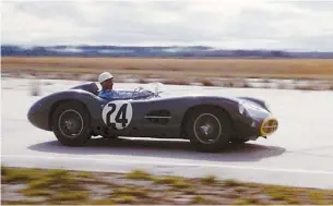  ??  ?? Stirling Moss in an Aston Martin in 1958: driving is ‘really – dangerousl­y – exciting’