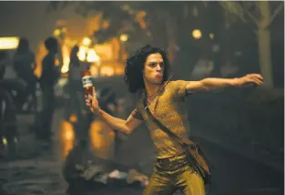  ?? Philippe Bosse / Roadside Attraction­s ?? Ray (Jonny Beauchamp) is in riot mode in “Stonewall,” Roland Emmerich’s fictional take on the 1969 Stonewall riots.