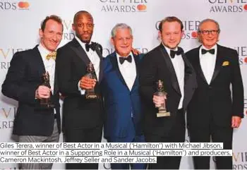  ?? Photos by AP and Rex Features ?? Giles Terera, winner of Best Actor in a Musical (‘Hamilton’) with Michael Jibson, Cameron Mackintosh, Jeffrey Seller and Sander Jacobs.