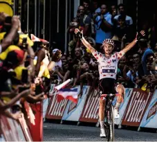  ??  ?? Celebratin­g his second stage win of the 2018 Tour in Luchon