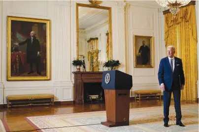  ?? The Associated Press ?? Q President Joe Biden leaves after a virtual event with the Munich Security Conference in the East Room of the White House on Friday in Washington.