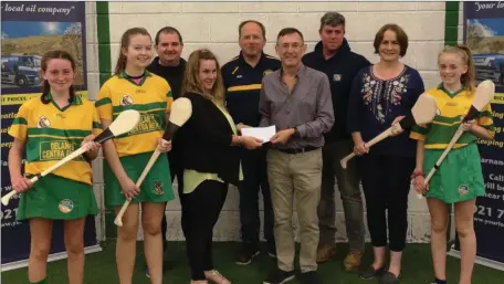  ??  ?? Pictured at the launch of Cloughduv Camogie Clubs Race night which is being held in the Spreading Chestnut Cloughduv on Friday October 4th are from left Amy Sheppard, Anna Devine, Julie Finnegan, Secretary, Tim Holland(Ross Oil, main sponsors) Liz Ryan, Emma Deasy. Back row Charlie Foley, Michael Bateman and Tony Finnegan(Ross Oil) .