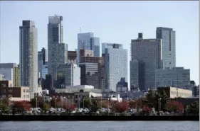  ?? Mark Lennihan/Associated Press ?? The Long Island City waterfront and skyline are shown Nov. 7 in the Queens borough of New York. One of the areas that Amazon is considerin­g for a headquarte­rs is Long Island City.