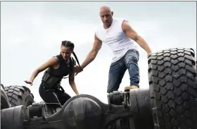  ?? UNIVERSAL PICTURES ?? Ramsey (Nathalie Emmanuel) and Dom (Vin Diesel) are back in “F9,” directed by Justin Lin.