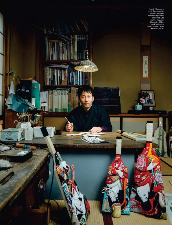  ??  ?? Kazuki Nishiyama in his Tokyo studio, where he makes decorative paddles known as Edo oshi-e hagoita. Opposite: A Noh mask by Kyotobased master carver Koukun Otsuki.