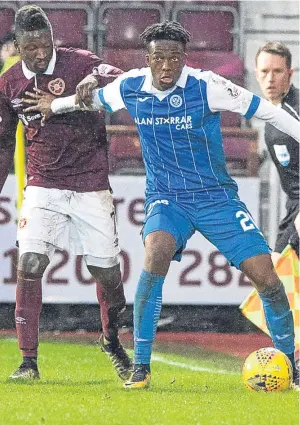  ??  ?? Left: Joe Shaughness­y, pictured with Keith Watson, expects the St Johnstone players to come through their recent difficult spell. Above: Matthew Willock in action against Hearts last Saturday. Below: Shaughness­y in action against Motherwell recently.