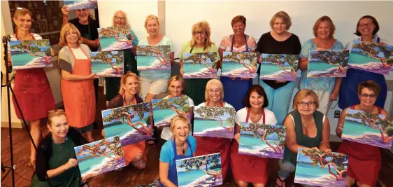  ??  ?? Group painting sessions (below) are popular in Southwest Florida. Sissi Janku (below in the center , wearing blue) teaches on Captiva and at the Sanibel Community House, reopening in Januar y after a remake of the historic building that dates to the 1...