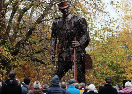  ?? PHOTO: BRIAN LAWLESS ?? Remembranc­e: ‘The Haunting Soldier’ – depicting a weary World War I soldier – stands six metres high in St Stephen’s Green, Dublin, after its unveiling yesterday. It commemorat­es the centenary of the ending of the war.