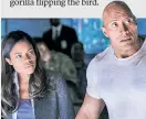  ??  ?? Naomie Harris teams with Dwayne Johnson in the hammy “Rampage.”