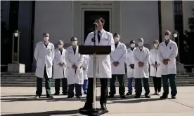  ?? Photograph: Ken Cedeno/Reuters ?? The White House physician, Dr Sean Conley, giving an update on Donald Trump’s condition after he was hospitalis­ed this weekend.