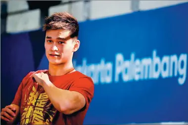  ?? LI XIANG / XINHUA ?? Sun Yang, China’s world and Olympic swimming champion, prepares for his training session in Jakarta on Wednesday.