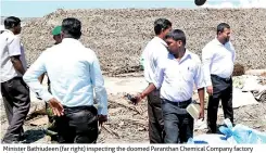  ??  ?? Minister Bathiudeen (far right) inspecting the doomed Paranthan Chemical Company factory site in Paranthan yesterday